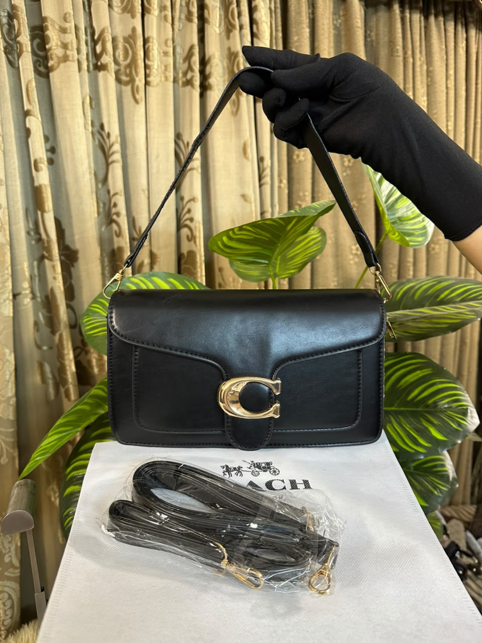 Coach Tabby Shoulder Bag 26 in brown smooth leather with gold C clasp and crossbody strap